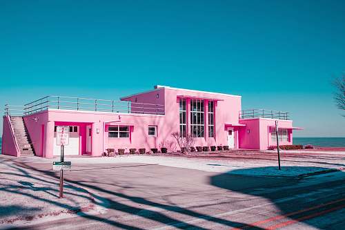indiana dunes national lakeshore pink concrete building under clear blue sky doors